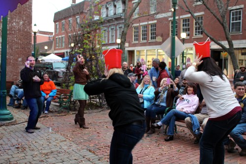 The "throw the ping-pong ball into a bucket tied to your partner's head" game