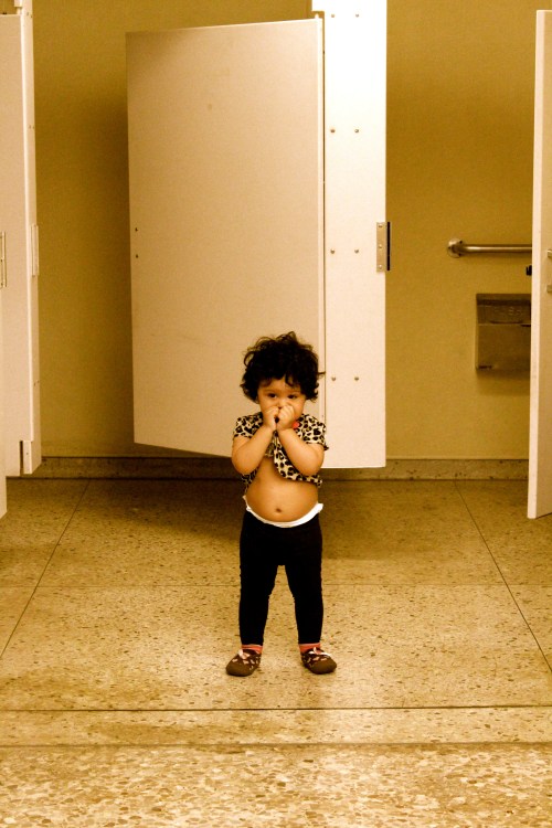 Adorable little one at the arch